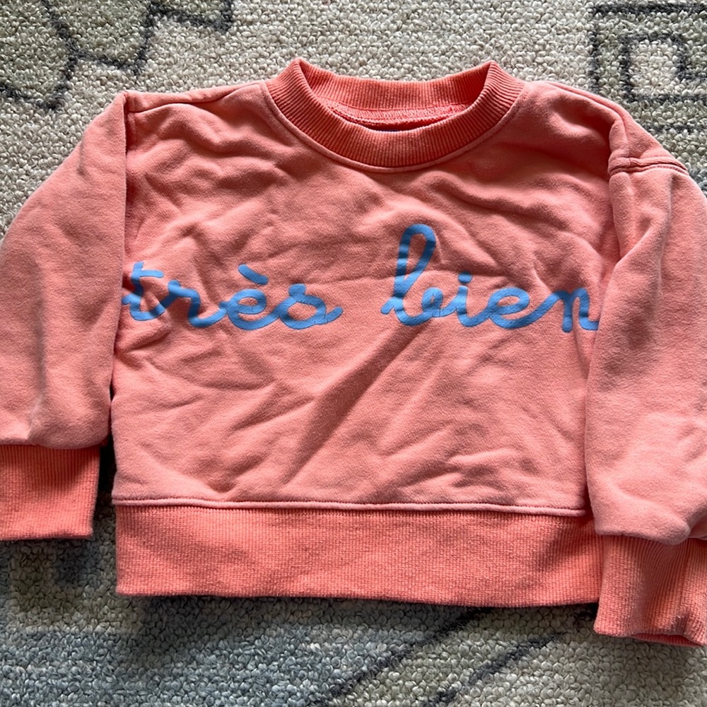 “très bien” salmon colored sweatshirt